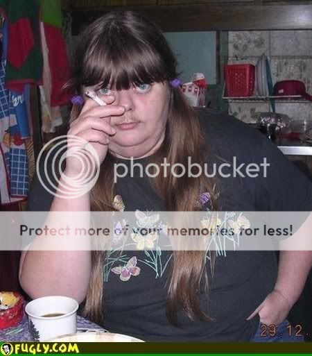 http://i175.photobucket.com/albums/w138/runsaskarun/Moustache_Fat_Troll_Woman.jpg